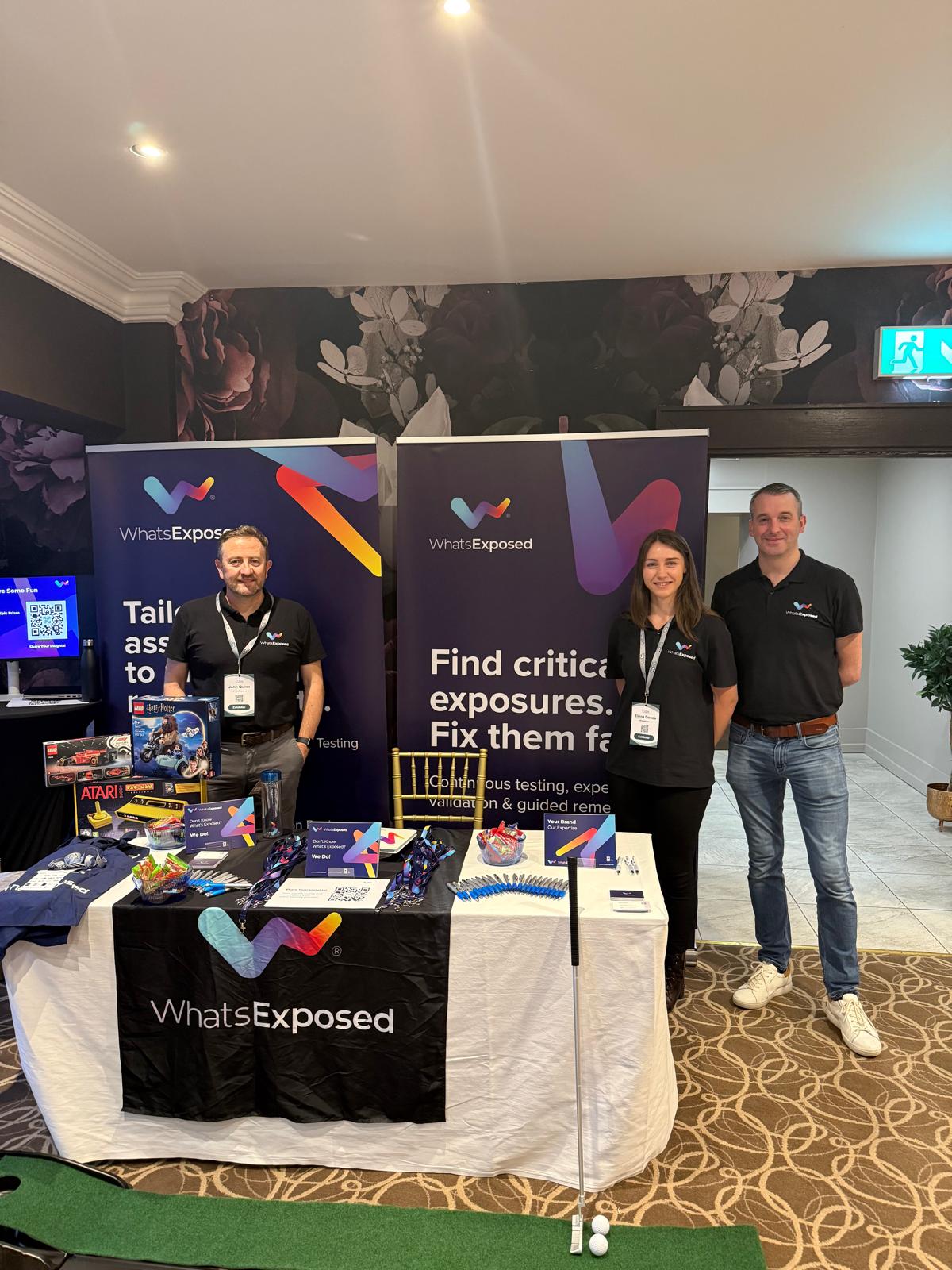 WhatsExposed stand at event